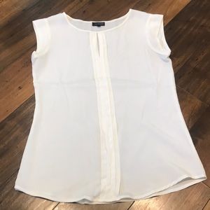 Off white sleeveless blouse